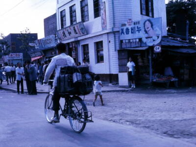 Seoul busy street scene with soap ad 1960